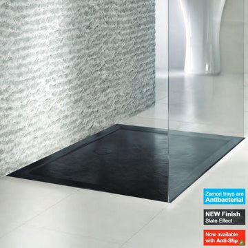 Sleek black shower tray with slate effect and anti-slip feature.