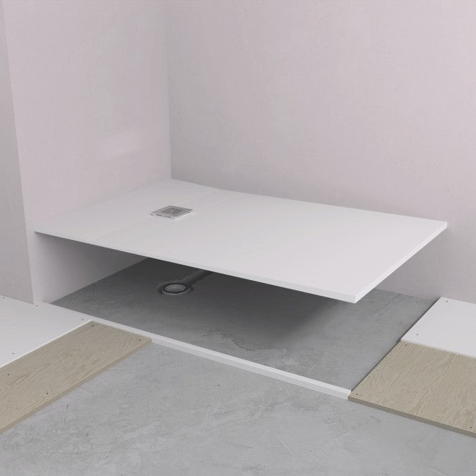 Microcement Aqua4ma Evolution wetroom tray with end waste, measuring 1340 x 1000 x 25mm, installed in a bathroom setting for a seamless finish.