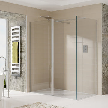 Modern wetroom with glass shower enclosure and sleek design.