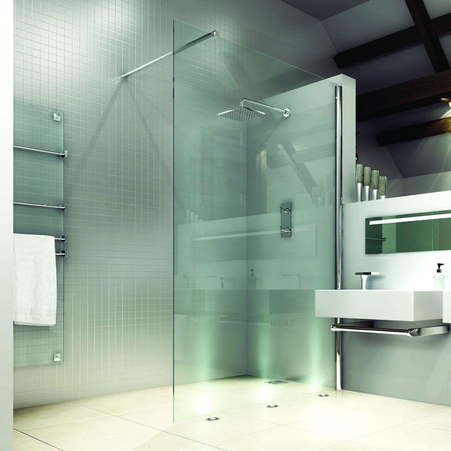 Modern wet room with glass shower screen and sleek fixtures.