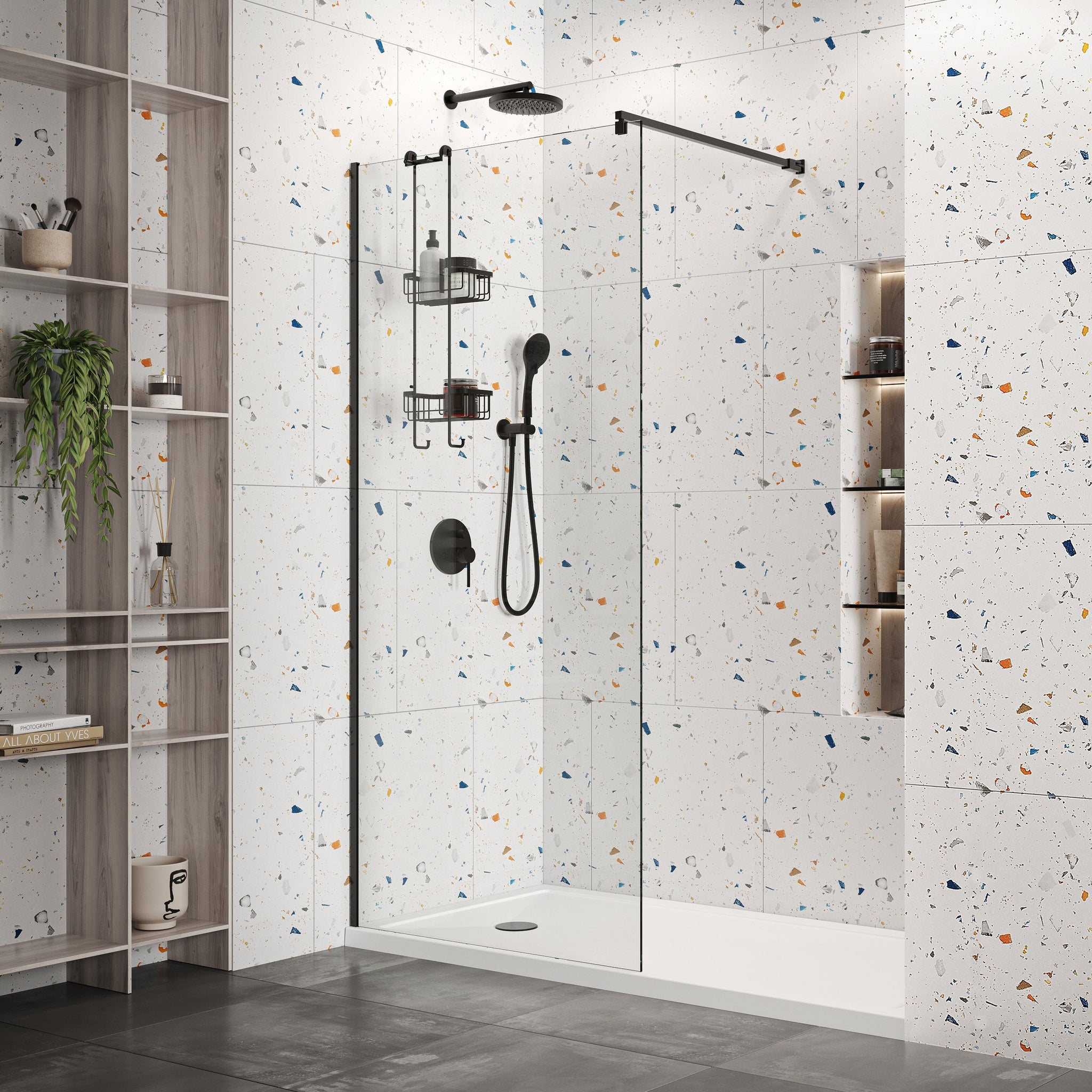Modern wet room with a sleek glass shower screen and terrazzo tiles.