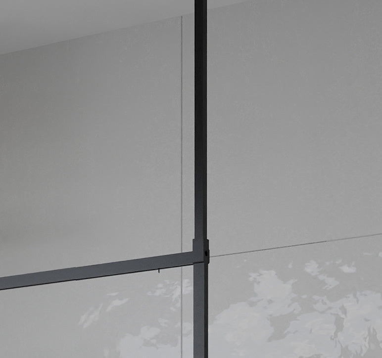 Vertical Roman Innov8 square wetroom bracing bar in matt black, ensuring stability for 8mm glass shower enclosures. Sleek and durable bathroom accessory.
