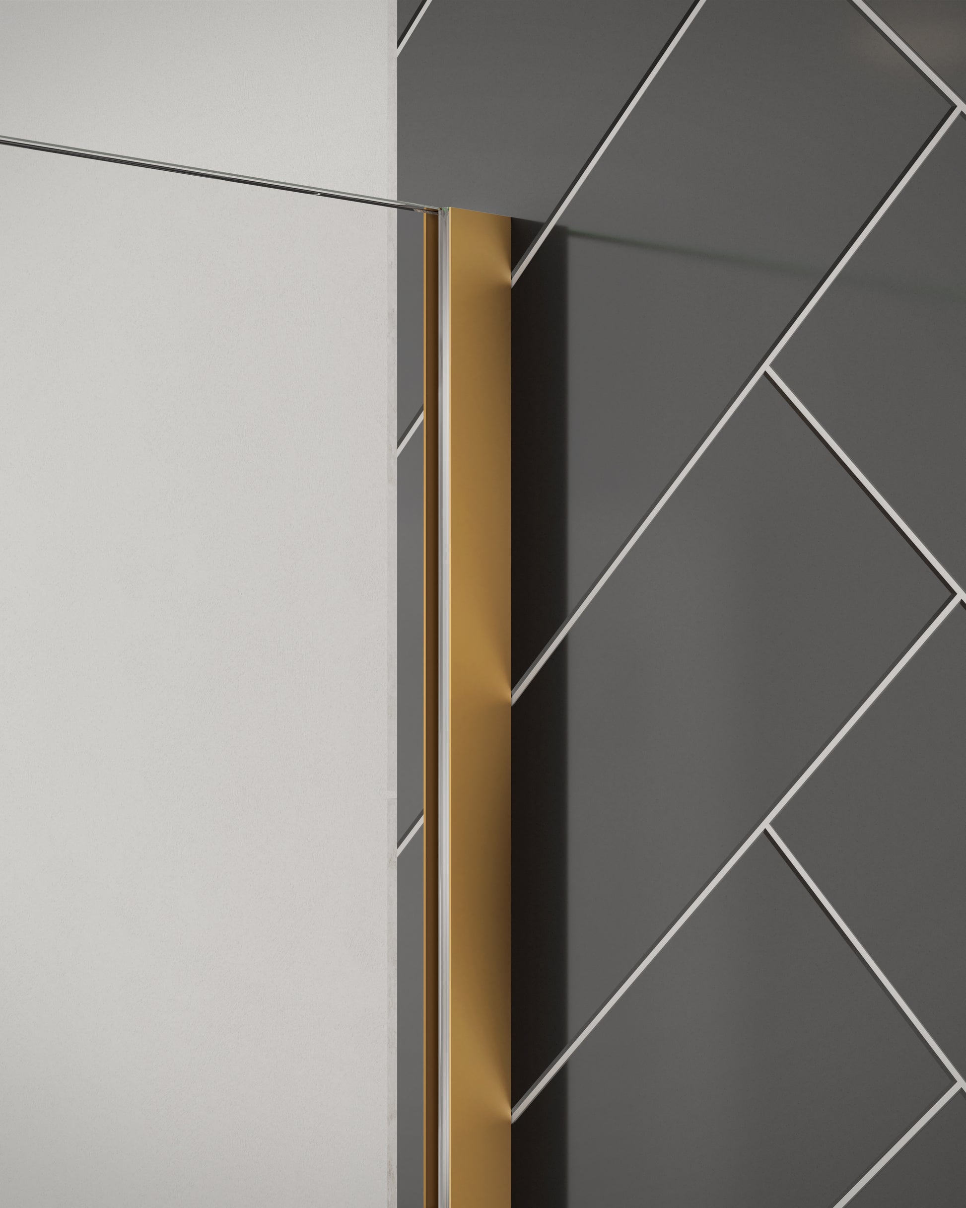 Close-up of Merlyn 8mm wetroom panel shower screen with brushed bronze wall profile. Installed against black herringbone tiles.