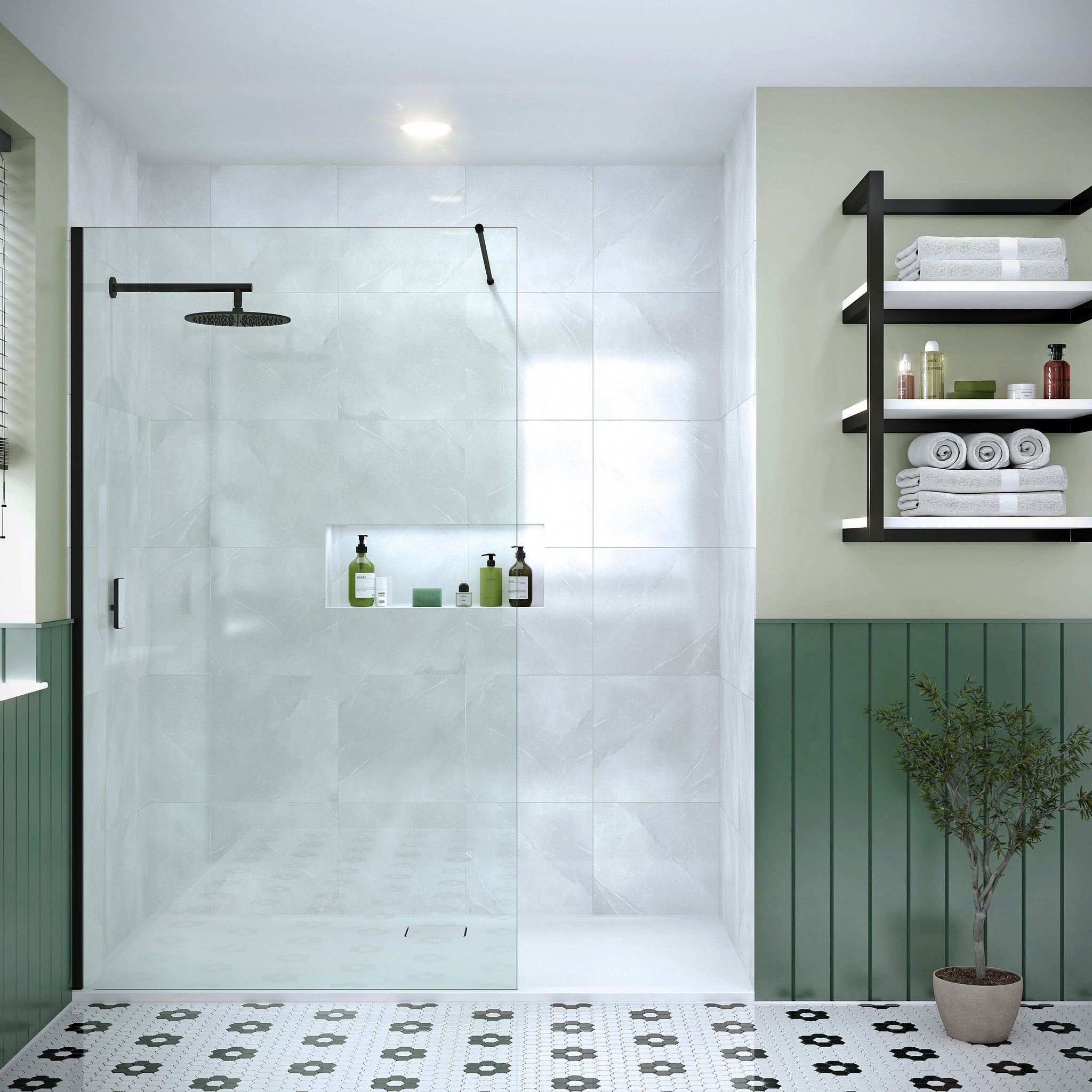 Merlyn 8mm wetroom panel shower screen in a modern bathroom with green paneling and white tiles. Features a black frame and rainfall showerhead.