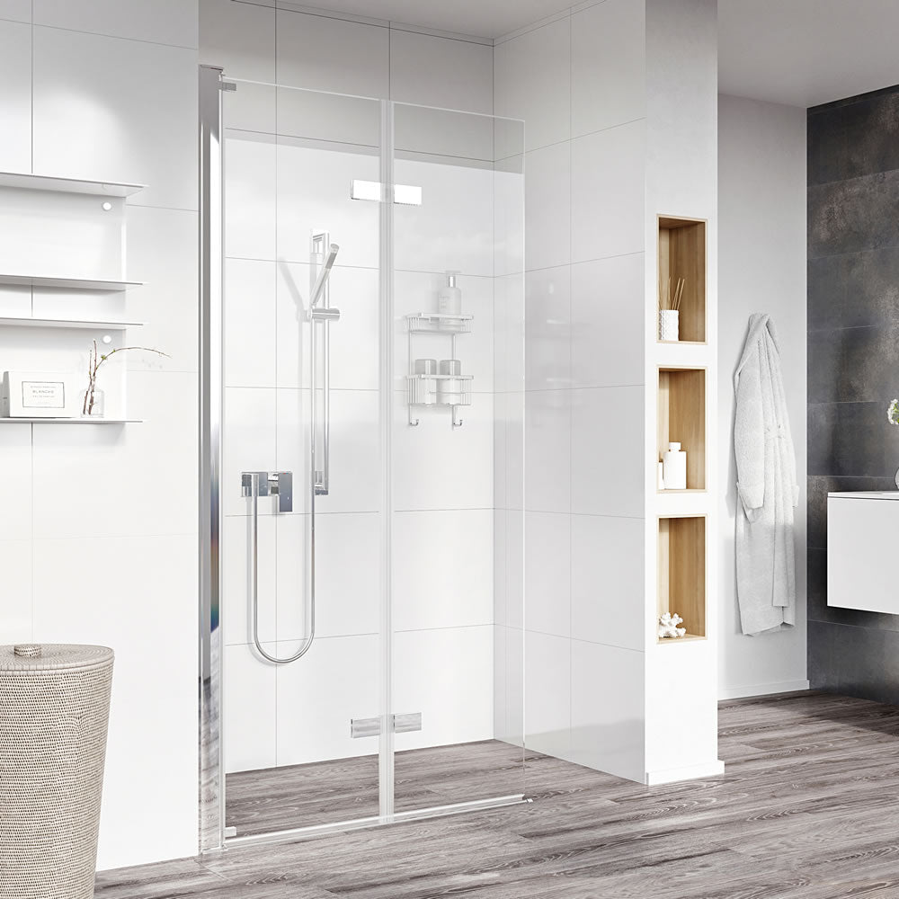 Roman Innov8 BiFold Folding Wet Room Shower Screen Panel 1000mm with frameless design, installed in a modern bathroom with white tiles and wooden accents.