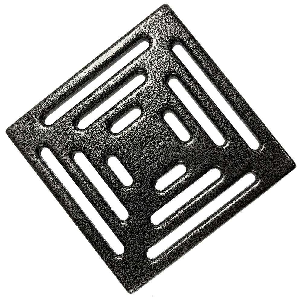 Hammered silver pressed stainless steel drain cover for WetBase® wet room shower trays, offering a textured finish with a slotted design.