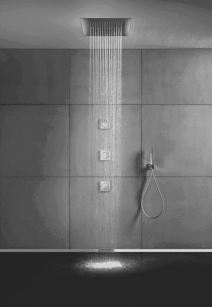 Modern wet room setup featuring WetBase® One Infinity tray with overhead rainfall shower and wall-mounted controls in a tiled environment.