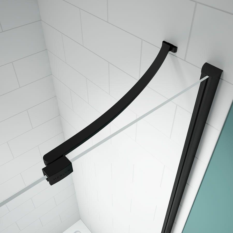 Merlyn black hinge door with inline and side panel in wet room