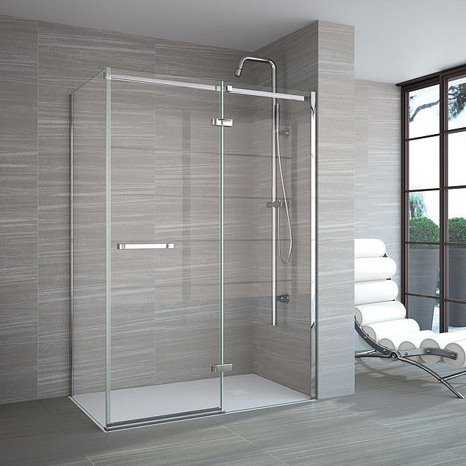 Merlyn 8 Series Frameless Hinged Shower Door & Inline Panel with Side Panel in a modern wet room with chrome fittings and minimalist design.