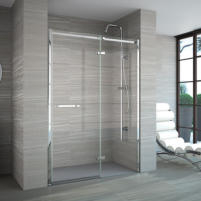 Merlyn 8 Series Frameless Hinged Shower Door & Inline Panel in a modern wet room with chrome fittings and minimalist glass design.