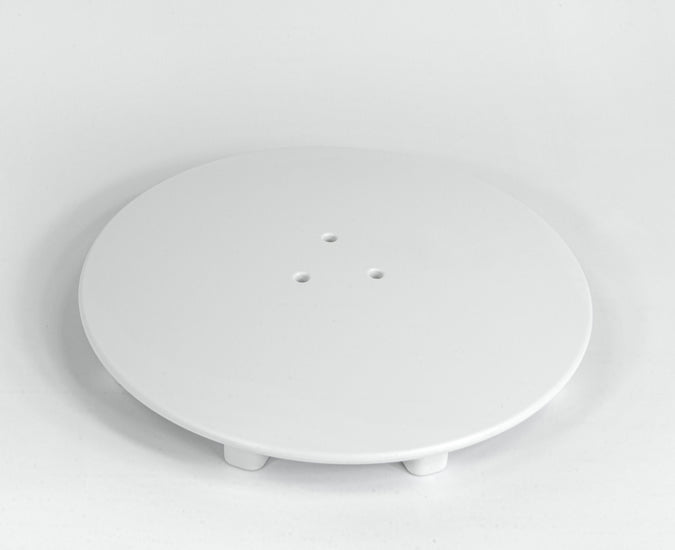 White round waste cover for the Roman Stone Solid Surface Anti Slip Shower Tray, designed to blend seamlessly with the shower tray surface.
