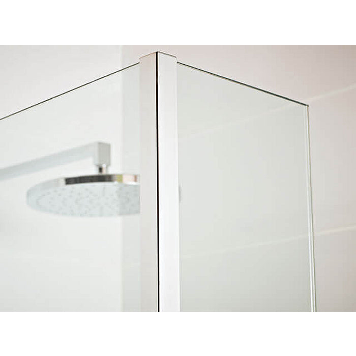 Roman Haven Fixed Shower Screen Deflector Panel, 200mm wide, installed in a modern wet room. Features a sleek glass design with a polished chrome finish.