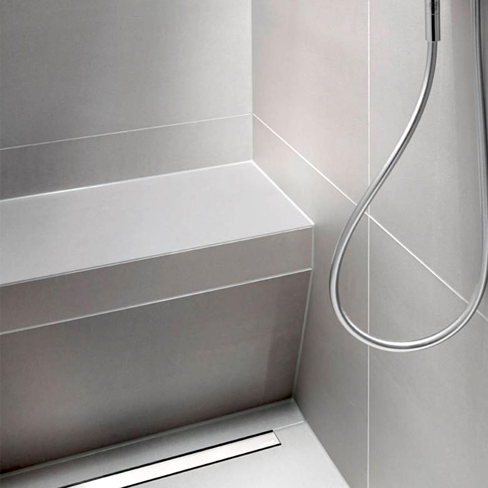 Installed wedi Sanoasa Bench Wet Room Shower Seat - Angled, integrated into a tiled shower area for disabled and mobility showering.